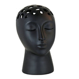 Let your imagination bloom with this unique and stylish head vase!