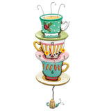 This clock features 3 colourful stacked teacups with unique patterns, as well as a&nbsp;fully functional teapot pendulum.