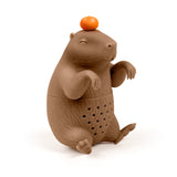 This happy little critter is ready to brew you the cosiest cup of tea