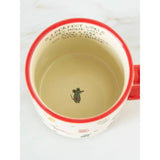 This ceramic mug features a cute mouse print at the bottom of the mug!
