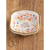 This trinket dish features a super sweet sentiment and will be an everyday reminder to your sister that she is loved!