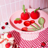 These cherry salt and pepper shakers come as a pair of ceramic cherries with removable tops, ideal for adding a cute and functional touch to your table.