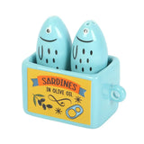 Bring a touch of whimsical charm to your dining table with these ceramic salt and pepper shakers. 